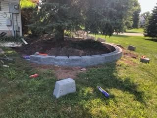 Circular paver retaining wall, in progress